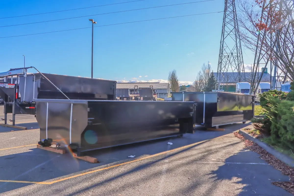 Roll-off dumpster ready for waste disposal at job site for Roofing Dumpster Rental in Holdenville